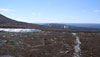 Utsikt västerut från kalfjället mellan Städjan och Nipfjället. Ost- och Nordbackarna syns med små snöfält. Norra dalarna. 23 Maj 2004. [Foto: Gerard J. Kleywegt]